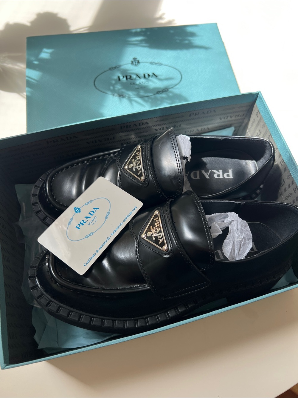 Prada Black Leather Loafers with Triangle Logo Plaque